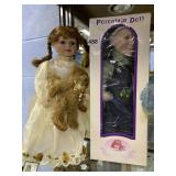 TWO PORCELAIN DOLLS GIRL WITH TEDDY BEAR AND BOY