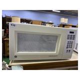 GE MICROWAVE WITH TURNTABLE 20 INCHES WIDE