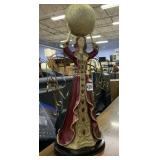 WOMAN HOLDING BALL 17" H