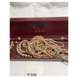 FAUX PEARLS W/ NICE CLOSURE SOME LOOSE AND