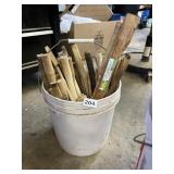 SMALL BUCKET OF HAMMER SHAFTS SOME USED AND