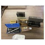 PUNCHES AND OLSON AND OTHERS WITH STEP DRILL BIT