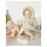 TWO PORCELAIN DOLLS INCL. ONE LAYING DOWN ONE