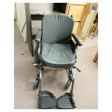 N U MOTION WHEELCHAIR W/ FOOTRESTS FOLDS UP