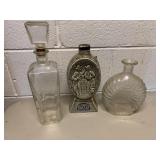 TWO GLASS DECANTERS AND ONE GYM BEAM
