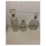 THREE GLASS DECANTERS INCLUDING JIM BEAM BOWLING