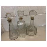 THREE GLASS DECANTERS INCLUDING JIM BEAM BOWLING