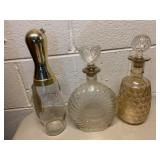 THREE GLASS DECANTERS INCLUDING JIM BEAM BOWLING