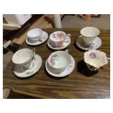 SIX ASSORTED TEACUPS