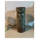 11 INCH BROWN GLAZED VASE  SO ACCORDING TO THIS
