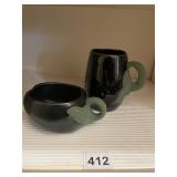 2 POTTERY MUGS GREEN HANDLES