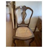 CANE SEAT ARMLESS CARVED BACK CHAIR 18.5" W X 37"