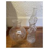 GLASS FIGURAL BOTTLE WITH CHILDREN CLIMBING A