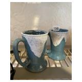 TWO GLAZED POTTERY MUGS