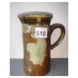 7" HANDLED GLAZED POTTERY PITCHER SIGNED ON BASE