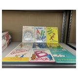 DR SUESS BOOKS AND RED BOOK HOLDER BROKEN