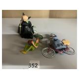 PETER PAN, WITCH, AND GIRL ON BIKE