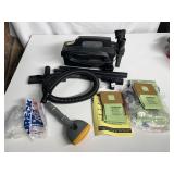 ORECK XL CANISTER VACUUM WITH BAGS AND SPARE