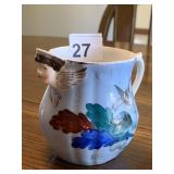 PORCELAIN CREAMER WITH ANGEL FACE SPOUT HAND