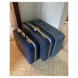 THREE BLUE VINTAGE SUITCASES