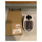 PLUG IN PORTABLE MINI HEATER
