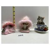 THREE CATS ONE SOLELY DEVOTED TO A CURE IN SHOE,