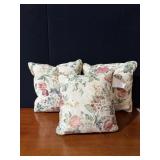 THREE FLORAL ACCENT PILLOWS