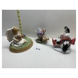 THREE FIGURINES ONE NURTURING HEART BY THE