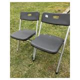 TWO PLASTIC BLACK FOLDING CHAIRS