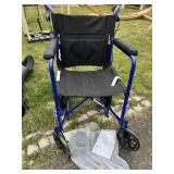 NEW XCEL TRANSPORT CHAIR, LEG SUPPORT STILL IN