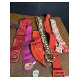 AGAIN, THIS IS A GROUP OF BELTS RED LEATHER
