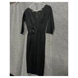 BLACK NELSON CAINE NY PIN ON FLOWER 17 INCH