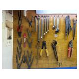 CRESCENT WRENCH AND WRENCHES ALL ON WALL