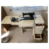 SINGER SEWING MACHINE AND CABINET