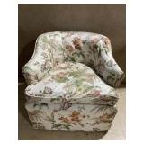 SWIVEL BASE FLORAL DESIGN ARMCHAIR