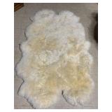 GENUINE SHEEPSKIN RUG 70 INCH BY 41 IN GOOD