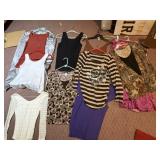 LARGE ASSORTMENT OF CLOTHES SEE PHOTOS