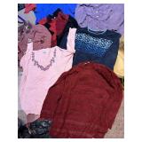 LARGE ASSORTMENT OF CLOTHES SEE PHOTOS