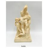 9" COMPOSITION JESUS AND MARY BEING HELD