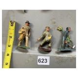 CAST IRON FIGURE OF FARMER WITH CORN, FARMER