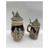 PAIR OF GERMAN STEINS WITH PEWTER LIDS, LARGEST