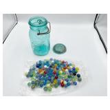 BLUE BALL GLASS JAR FILLED WITH MARBLES