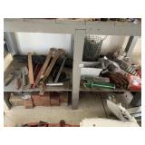 CONTENTS OF BOTTOM OF WORK BENCH AND BRICKS