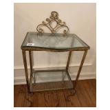 GLASS TWO-TIERED DISPLAY TABLE WITH BOWED FRONT