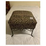 IRON LEG OTTOMAN W/ ANIMAL PRINT LIFT TOP