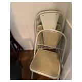 THREE FOLDING CHAIRS WITH CURVED BACK