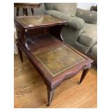 STEP BACK TABLE WITH LEATHER TOP ON TWO SECTIONS