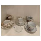 PHONE CHINA CUP AND SAUCER WITH GOLD DECORATION,