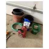 PLANTERS, HOSE, GAS CAN, SPREADER, PARTIAL SOIL