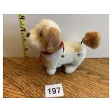 WIND UP DOG WITH HIS TAIL THAT WAGS FUNCTIONS